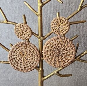 Round rattan boutique earrings about 2 inches in length